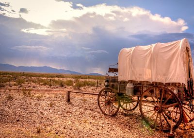 Antique Covered wagon in storm