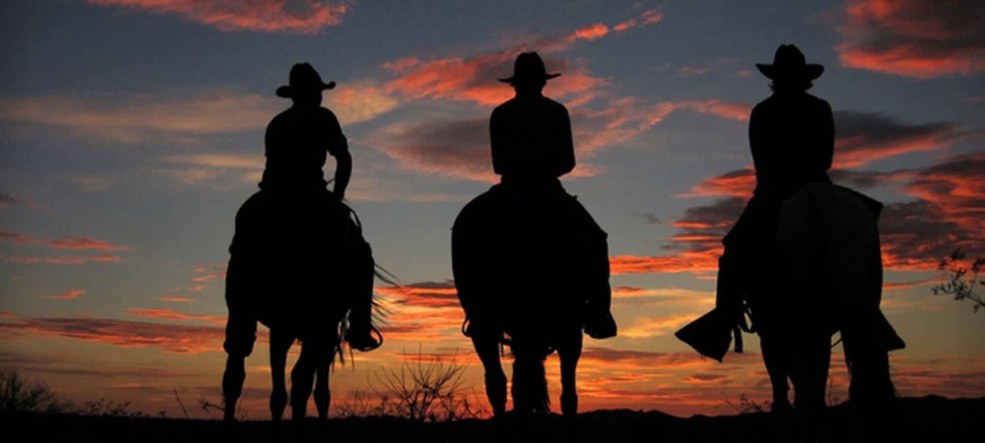 Cowboys at Sunset