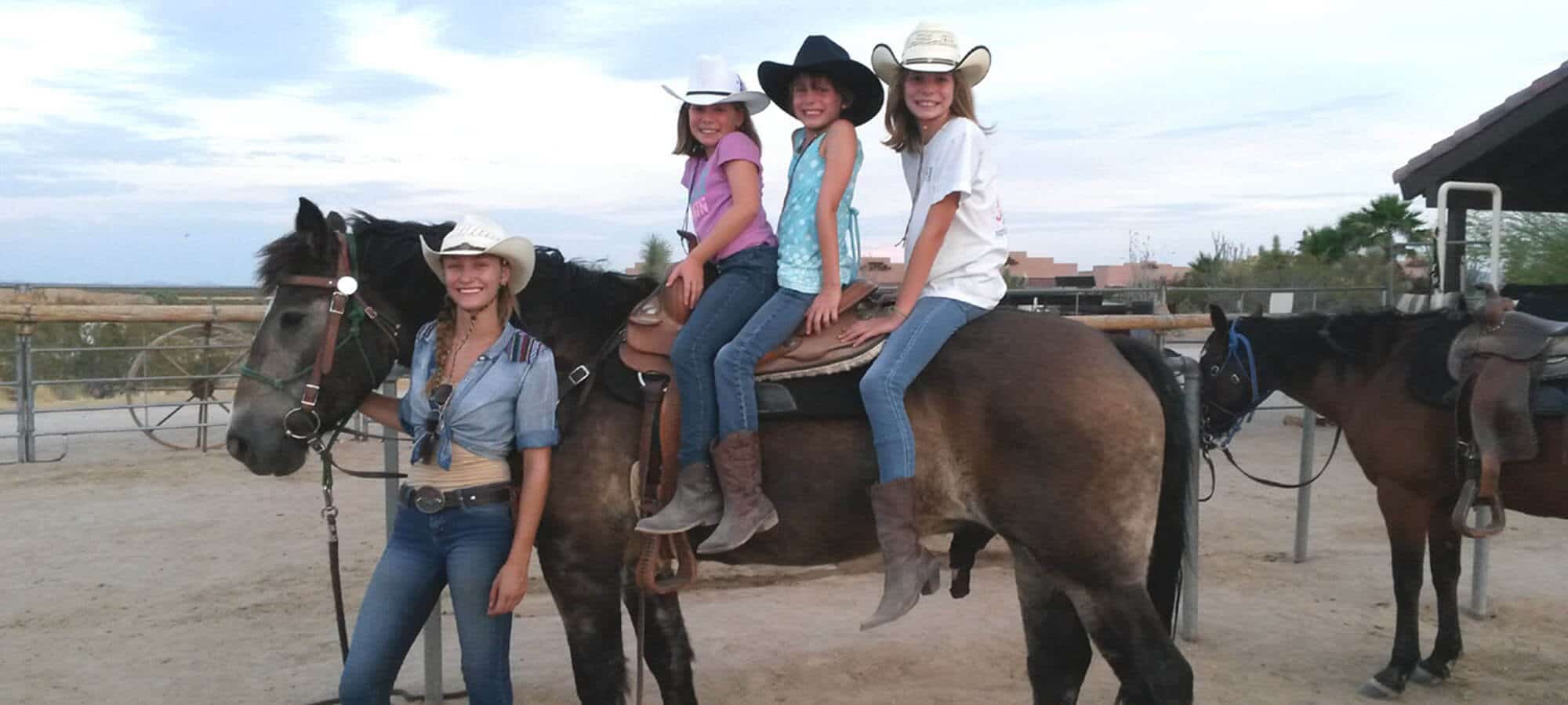 Girls riding horse